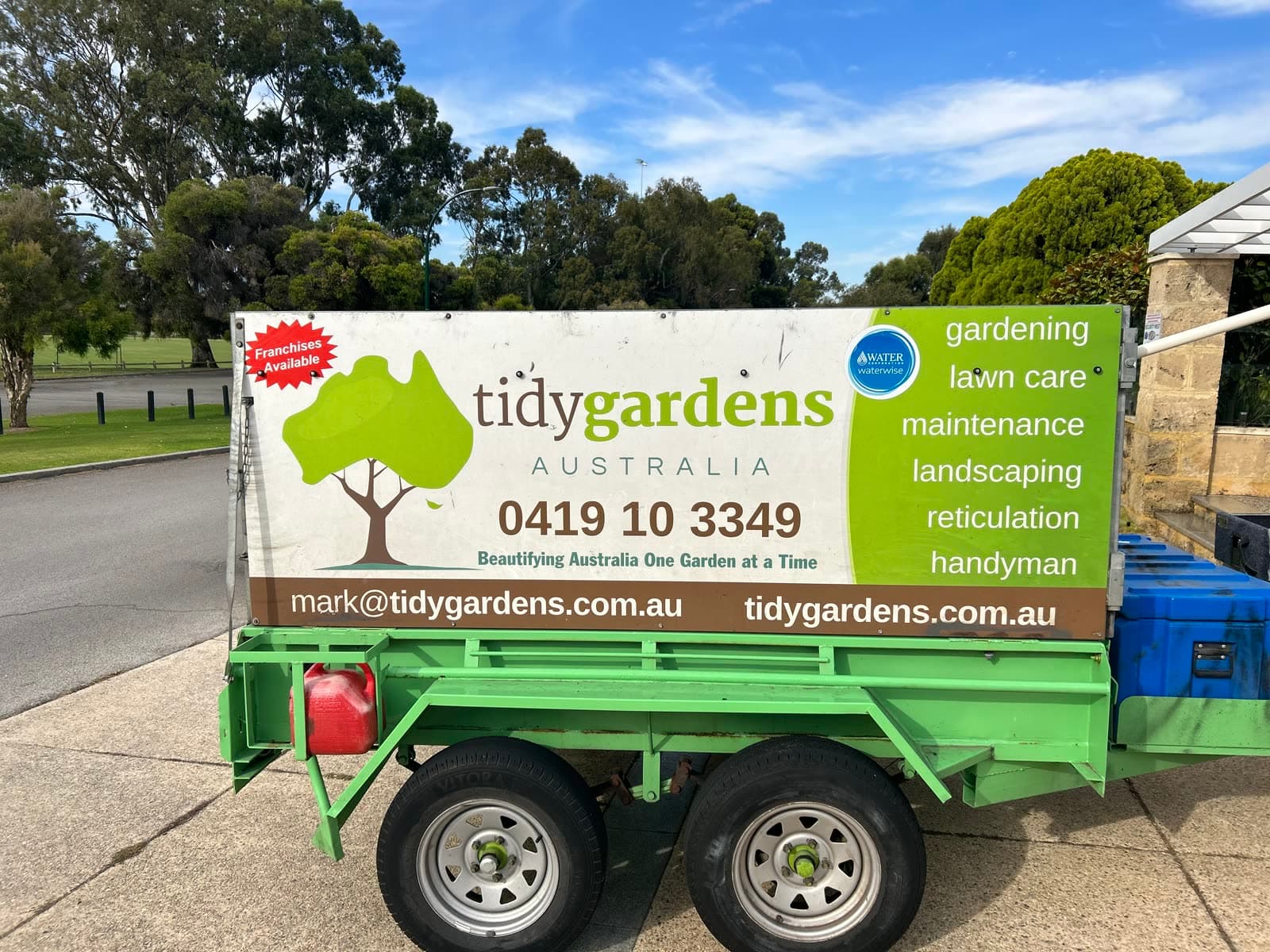 Tidy Gardens trailer and equipment set up on site.